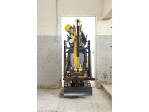 Mini-pelle hydraulique sur chenille pour tous travaux de transformation, terrassement, aménagement extérieur en location chez Valroc SA dans la Broye